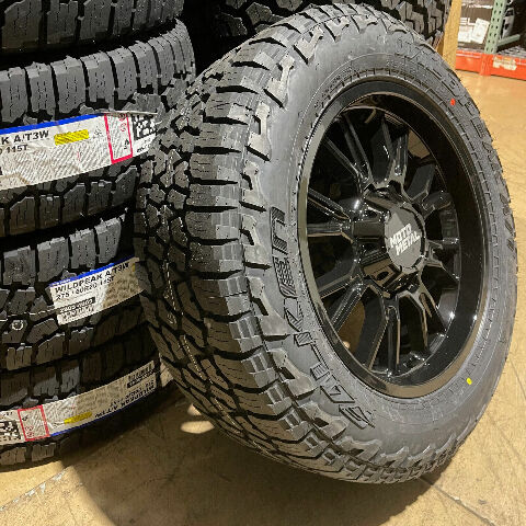 20x9 Black Moto Metal MO810 Wheels 33 Falken AT Tires 6x5.5 Chevy